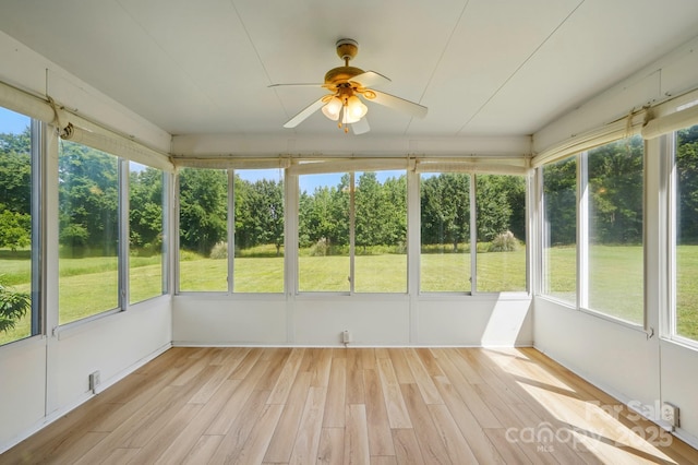 924 Secrest Hill Dr, Monroe, NC 28110 - unfurnished sunroom with ceiling fan and view of scattered trees