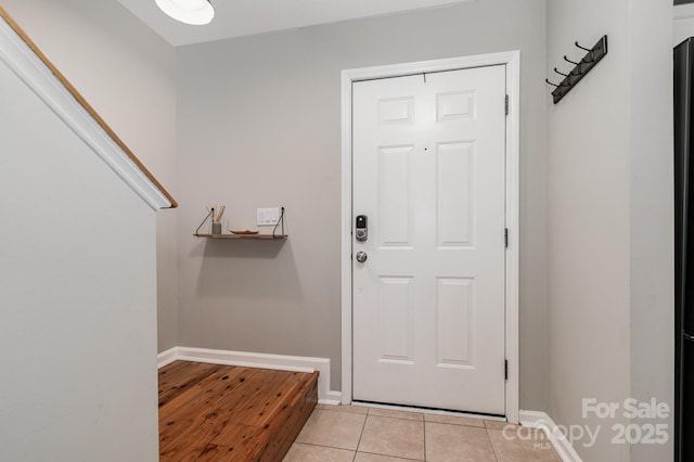 4124 Melrose Club Dr, Matthews, NC 28105 - entryway with baseboards and light tile patterned floors