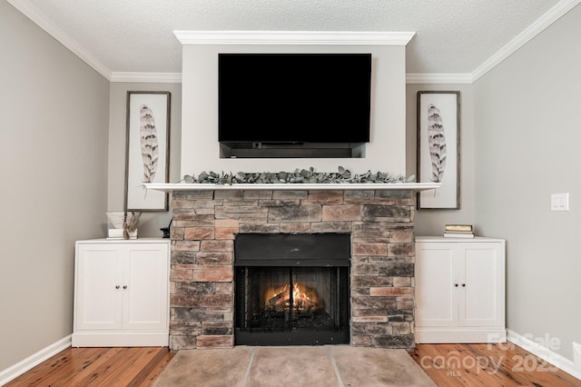 4124 Melrose Club Dr, Matthews, NC 28105 - detailed view of wood finished floors, a fireplace, ornamental molding, a textured ceiling, and baseboards