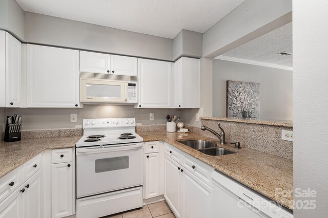 4124 Melrose Club Dr, Matthews, NC 28105 - kitchen featuring white appliances, a sink, a textured ceiling, white cabinets, and ornamental molding