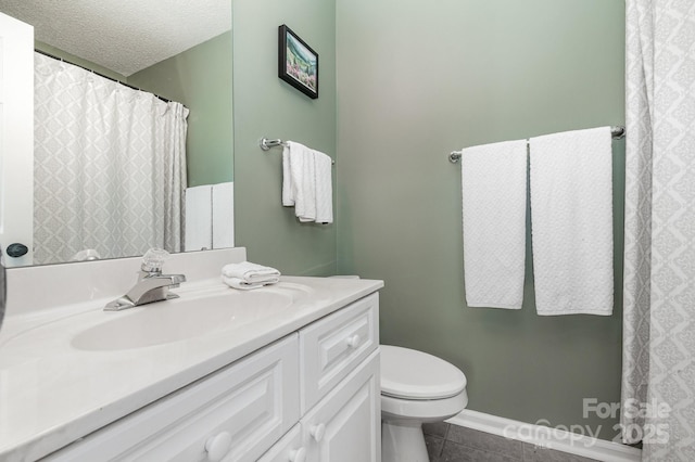 4124 Melrose Club Dr, Matthews, NC 28105 - full bath featuring vanity, toilet, tile patterned flooring, a textured ceiling, and baseboards
