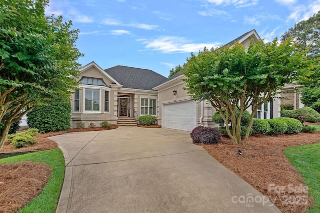 17308 Players Ridge Dr, Cornelius, NC 28031 - view of front of home with driveway, a garage, and stucco siding