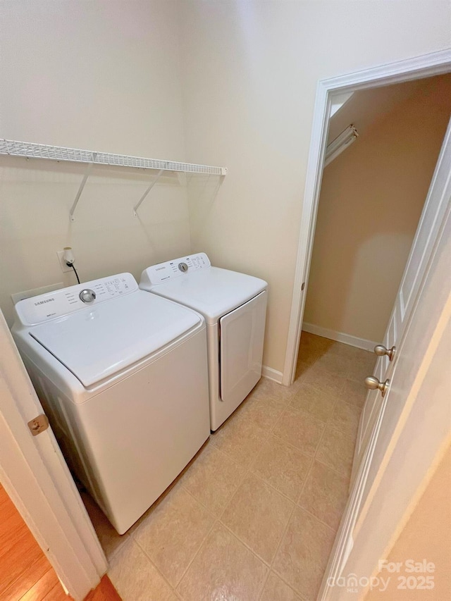 11624 Truan Ln, Cornelius, NC 28031 - washroom with washing machine and dryer and baseboards