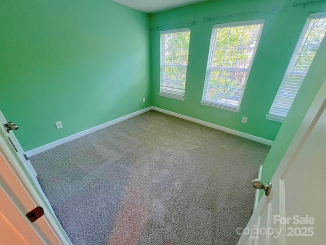 11624 Truan Ln, Cornelius, NC 28031 - carpeted spare room featuring healthy amount of natural light and baseboards