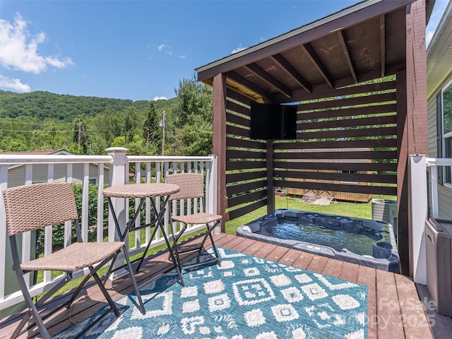 16 Sams Branch Rd, Candler, NC 28715 - wooden terrace featuring a view of trees and an outdoor hot tub