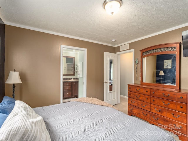 16 Sams Branch Rd, Candler, NC 28715 - carpeted bedroom featuring a textured ceiling, ensuite bath, a sink, and ornamental molding