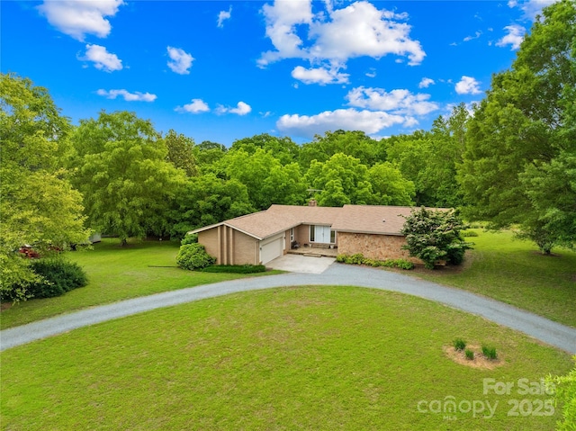 2309 Potter Rd S, Waxhaw, NC 28173 - view of front of property with driveway, a front yard, and a garage