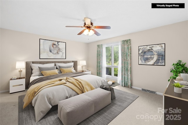 2309 Potter Rd S, Waxhaw, NC 28173 - carpeted bedroom with baseboards and a ceiling fan