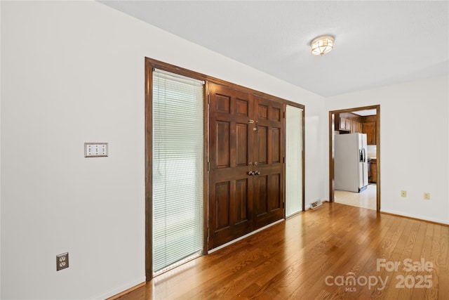 2309 Potter Rd S, Waxhaw, NC 28173 - foyer featuring light wood-style floors and baseboards