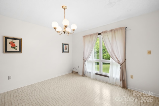 2309 Potter Rd S, Waxhaw, NC 28173 - spare room with a chandelier and baseboards