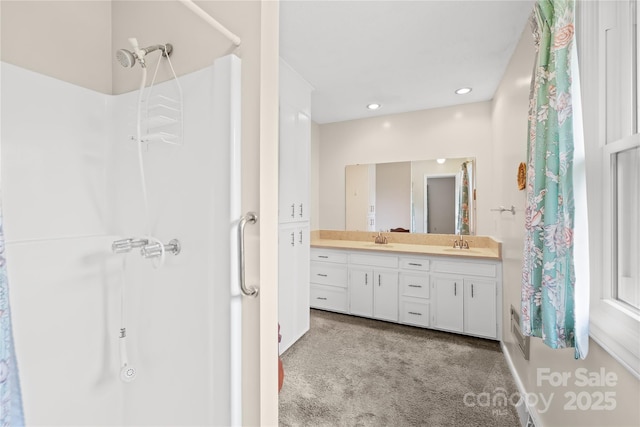 2309 Potter Rd S, Waxhaw, NC 28173 - full bath featuring a shower, double vanity, and recessed lighting