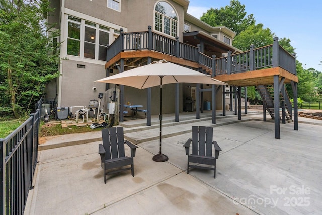 2006 Sandy Pond Ln, Waxhaw, NC 28173 - rear view of property with a patio, stucco siding, a deck, and stairs
