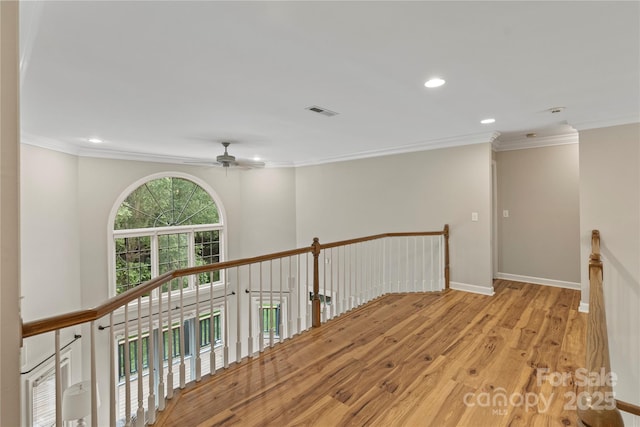 2006 Sandy Pond Ln, Waxhaw, NC 28173 - corridor featuring an upstairs landing, recessed lighting, wood finished floors, crown molding, and baseboards