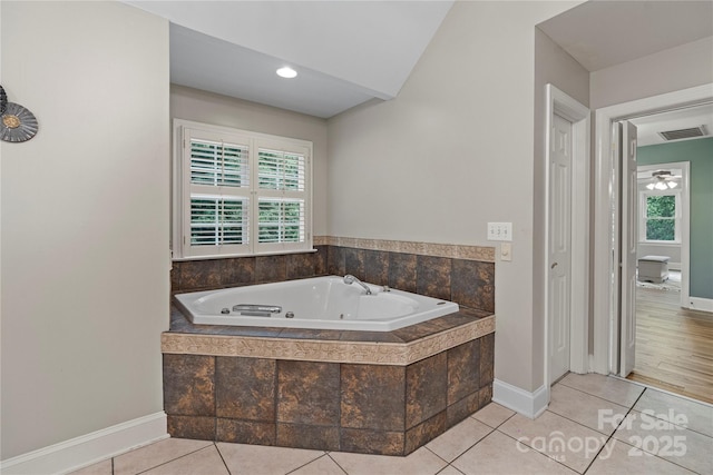 2006 Sandy Pond Ln, Waxhaw, NC 28173 - full bath with a jetted tub, plenty of natural light, and baseboards