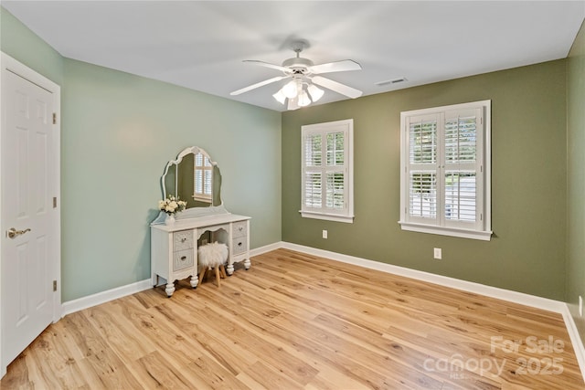 2006 Sandy Pond Ln, Waxhaw, NC 28173 - unfurnished bedroom with light wood finished floors, baseboards, and ceiling fan
