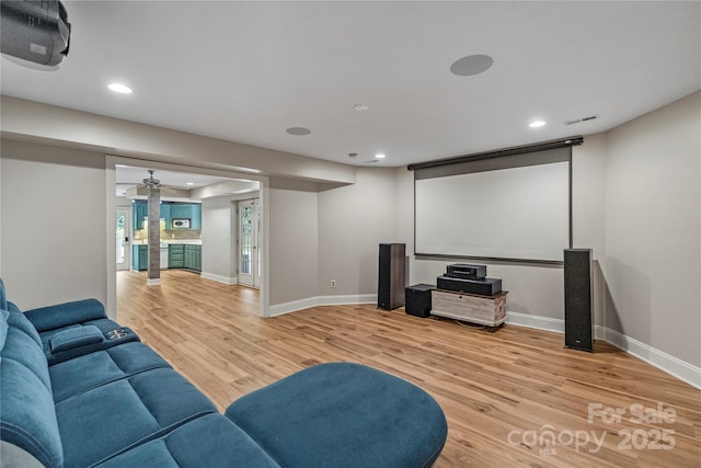 2006 Sandy Pond Ln, Waxhaw, NC 28173 - cinema room with light wood-style flooring, ornate columns, recessed lighting, and baseboards