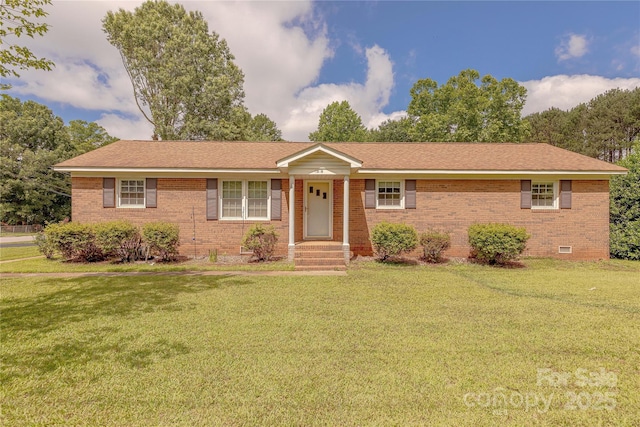 5840 Potter Rd, Matthews, NC 28104 - single story home featuring a front lawn, brick siding, and crawl space