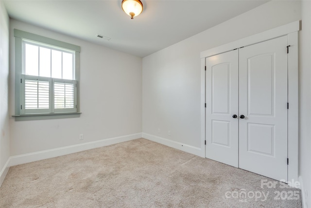 750 Waterscape Ct, Rock Hill, SC 29730 - unfurnished bedroom featuring carpet, baseboards, and a closet