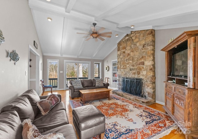5153 Glenwood St, Sherrills Ford, NC 28673 - living room with light wood-style flooring, a fireplace, ceiling fan, and baseboards