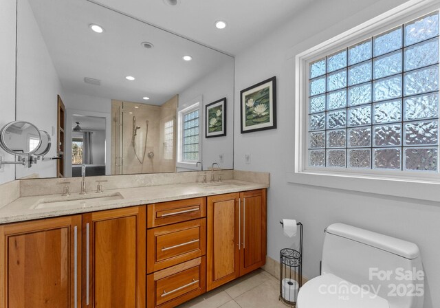 5153 Glenwood St, Sherrills Ford, NC 28673 - bathroom featuring plenty of natural light, a shower stall, double vanity, and recessed lighting