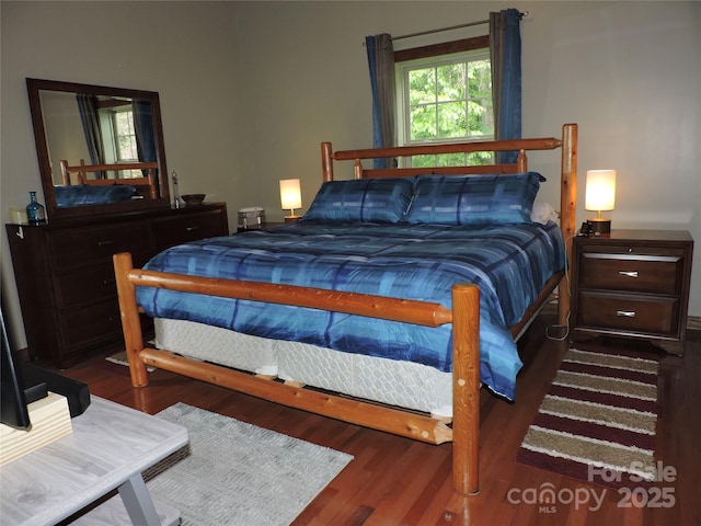 235 Red Oak Ln, Burnsville, NC 28714 - bedroom with wood finished floors
