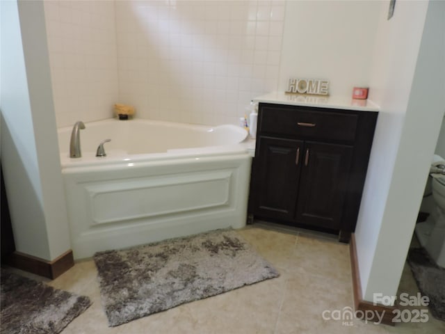 235 Red Oak Ln, Burnsville, NC 28714 - full bath with a garden tub, toilet, and tile patterned flooring