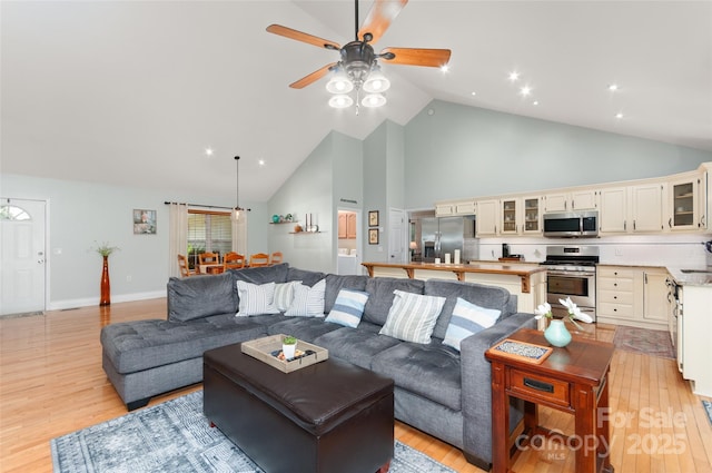 20 Grove Garden Ave, Candler, NC 28715 - living room with light wood-type flooring, high vaulted ceiling, a ceiling fan, and recessed lighting