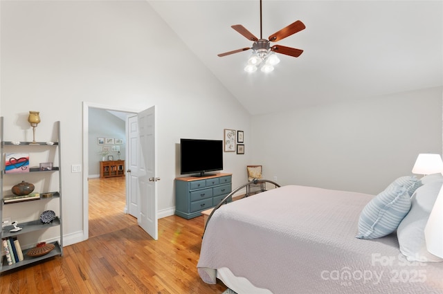 20 Grove Garden Ave, Candler, NC 28715 - bedroom with light wood finished floors, high vaulted ceiling, baseboards, and ceiling fan