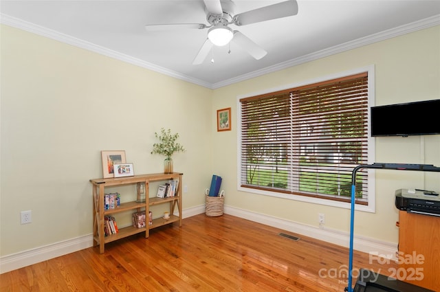 20 Grove Garden Ave, Candler, NC 28715 - miscellaneous room featuring ornamental molding, baseboards, ceiling fan, and wood finished floors