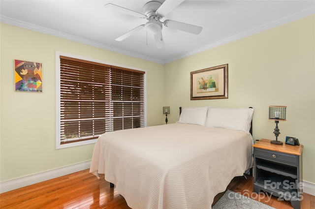20 Grove Garden Ave, Candler, NC 28715 - bedroom featuring wood finished floors, baseboards, ornamental molding, and a ceiling fan