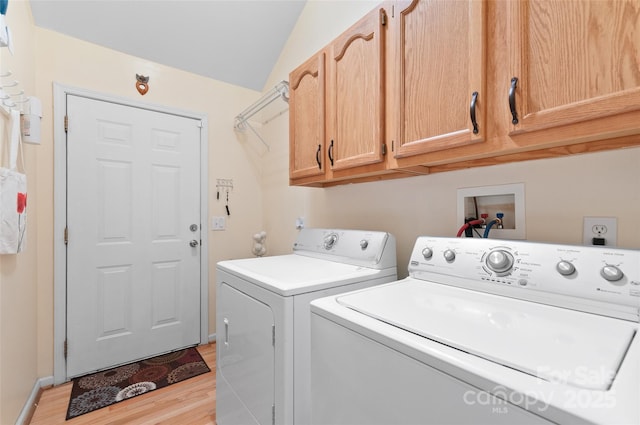 20 Grove Garden Ave, Candler, NC 28715 - laundry area featuring washing machine and dryer, cabinet space, and light wood-style flooring