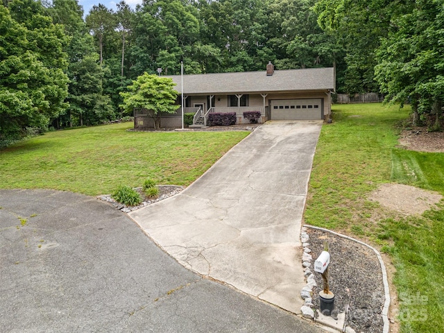 1142 Foxberry Rd, Lincolnton, NC 28092 - ranch-style home featuring a porch, a garage, driveway, and a front yard