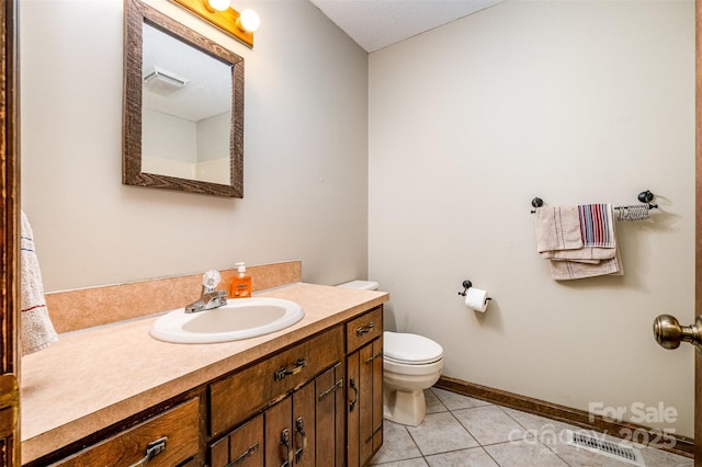 1142 Foxberry Rd, Lincolnton, NC 28092 - bathroom with toilet, vanity, and tile patterned flooring