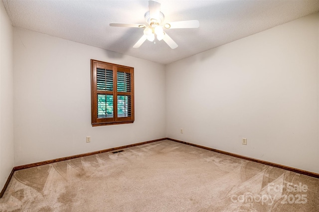 1142 Foxberry Rd, Lincolnton, NC 28092 - carpeted empty room featuring baseboards and ceiling fan