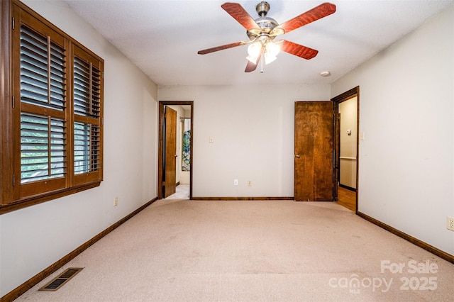 1142 Foxberry Rd, Lincolnton, NC 28092 - empty room featuring carpet, baseboards, and ceiling fan
