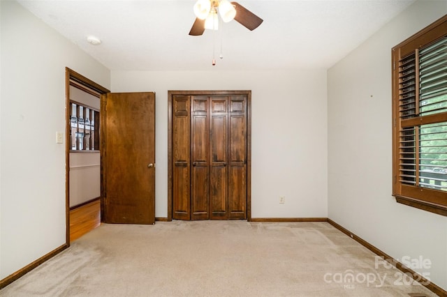 1142 Foxberry Rd, Lincolnton, NC 28092 - unfurnished bedroom with light carpet, baseboards, and ceiling fan