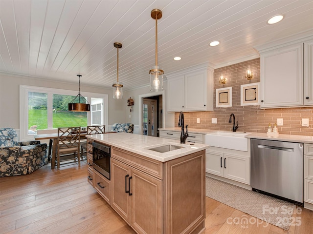 4201 Quail Hunt Ln, Charlotte, NC 28226 - kitchen with stainless steel dishwasher, a sink, built in microwave, an island with sink, and wood ceiling