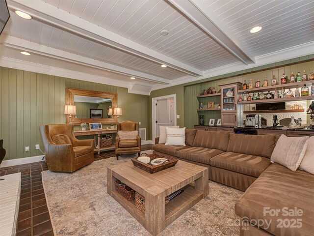 4201 Quail Hunt Ln, Charlotte, NC 28226 - living room with beam ceiling, bar with sink, wooden walls, and recessed lighting