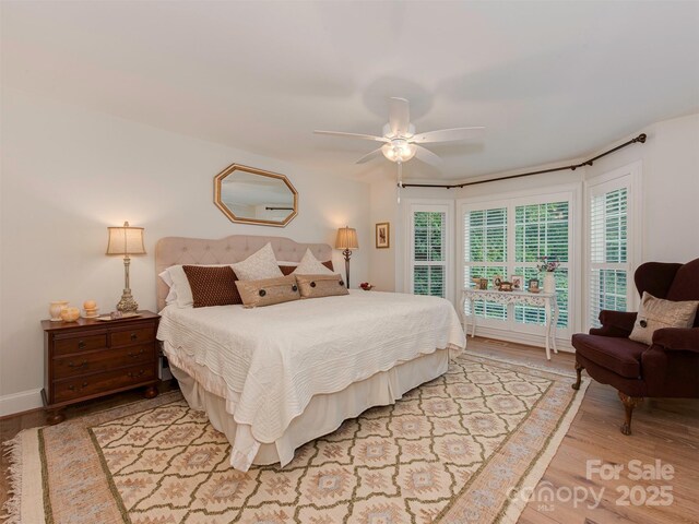 4201 Quail Hunt Ln, Charlotte, NC 28226 - bedroom with light wood-style floors and a ceiling fan