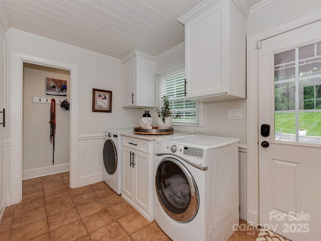 4201 Quail Hunt Ln, Charlotte, NC 28226 - washroom featuring cabinet space, healthy amount of natural light, crown molding, washing machine and clothes dryer, and a wainscoted wall