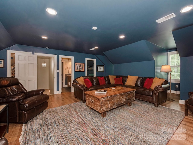 4201 Quail Hunt Ln, Charlotte, NC 28226 - living area with lofted ceiling, baseboards, wood finished floors, and recessed lighting