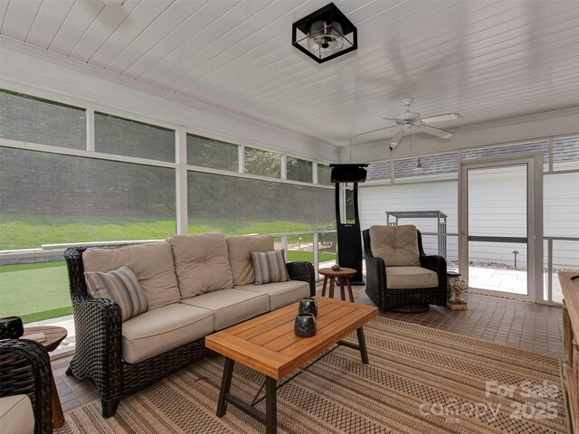 4201 Quail Hunt Ln, Charlotte, NC 28226 - sunroom with a ceiling fan and an outdoor living space