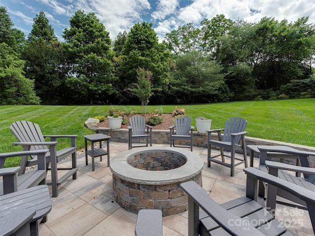 4201 Quail Hunt Ln, Charlotte, NC 28226 - view of patio / terrace featuring an outdoor fire pit and view of wooded area
