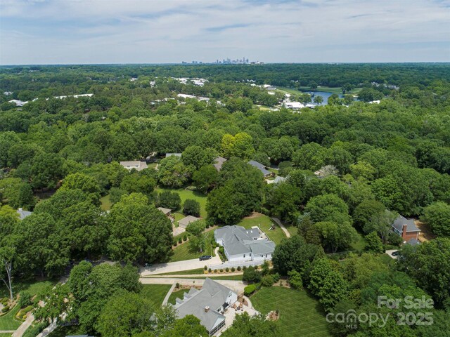 4201 Quail Hunt Ln, Charlotte, NC 28226 - view of property location with a heavily wooded area and a nearby body of water