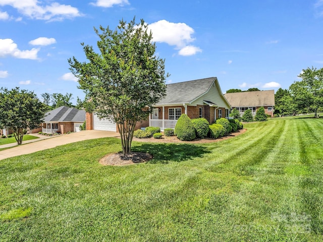 116 Memphis Way, Spindale, NC 28160 - ranch-style home featuring brick siding, concrete driveway, a front yard, and a porch