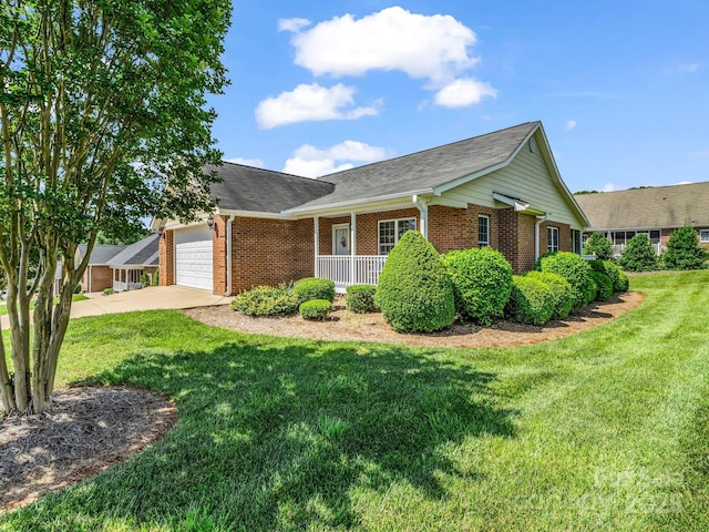 116 Memphis Way, Spindale, NC 28160 - ranch-style house featuring brick siding, covered porch, an attached garage, and a front yard