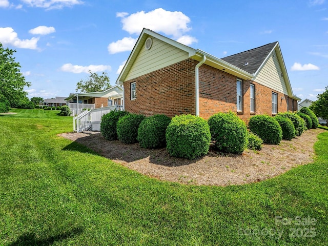 116 Memphis Way, Spindale, NC 28160 - view of side of home with brick siding and a lawn