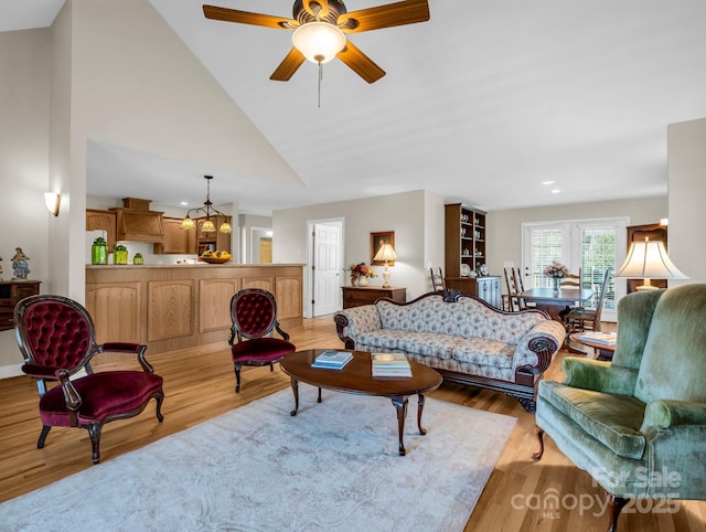 116 Memphis Way, Spindale, NC 28160 - living room with lofted ceiling, light wood finished floors, recessed lighting, a chandelier, and ceiling fan