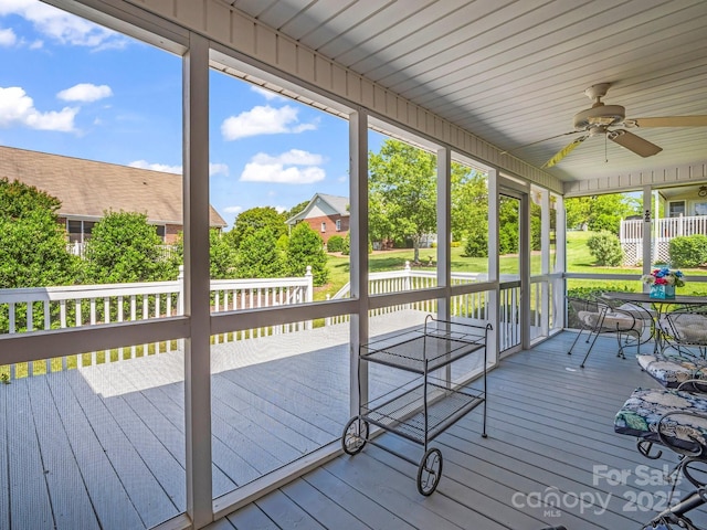 116 Memphis Way, Spindale, NC 28160 - unfurnished sunroom featuring ceiling fan and plenty of natural light