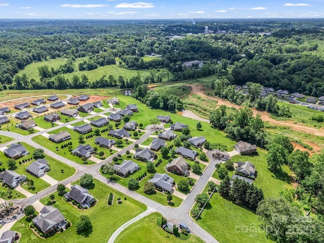 116 Memphis Way, Spindale, NC 28160 - aerial perspective of suburban area featuring a forest